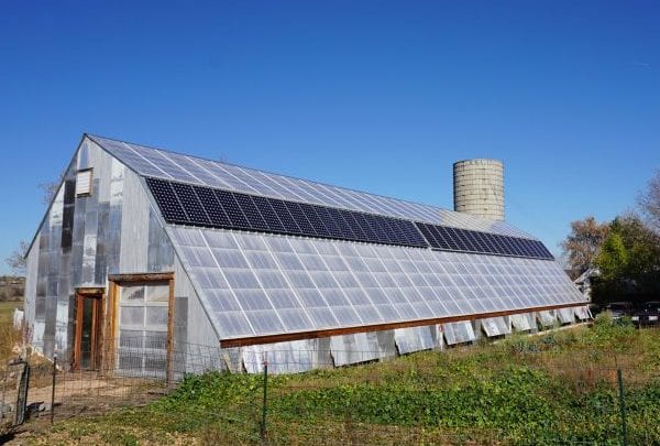 Off-grid commercial greenhouse with solar panels