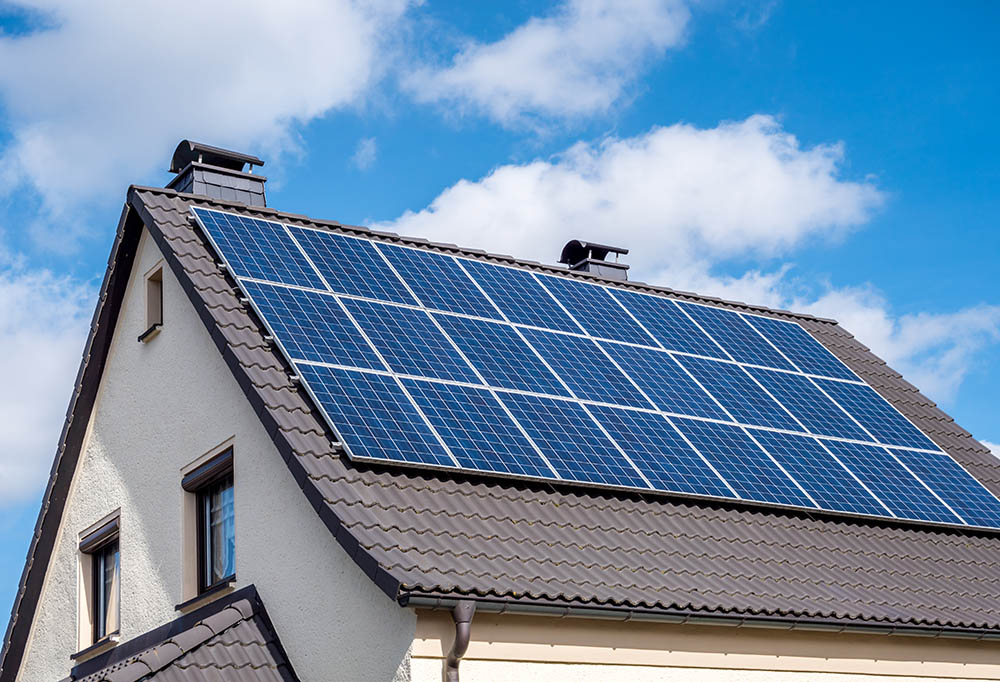 solar powered greenhouse- solar panels on house